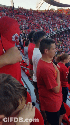 Boy In Red Shirt Saying Kansas GIF