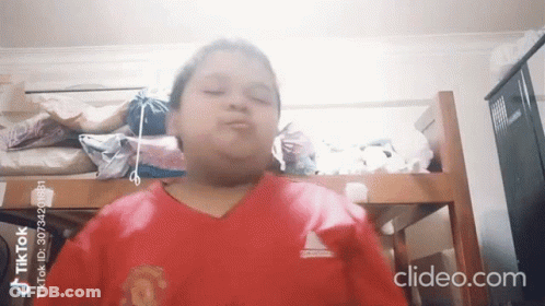 Boy In Red Shirt With Manchester United Logo GIF