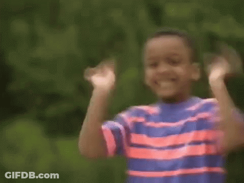 Boy In Red Striped Shirt Holding Red Object GIF