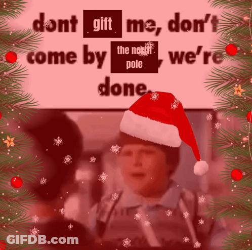 Boy In Santa Hat With Sign Saying Dont Gift Me GIF