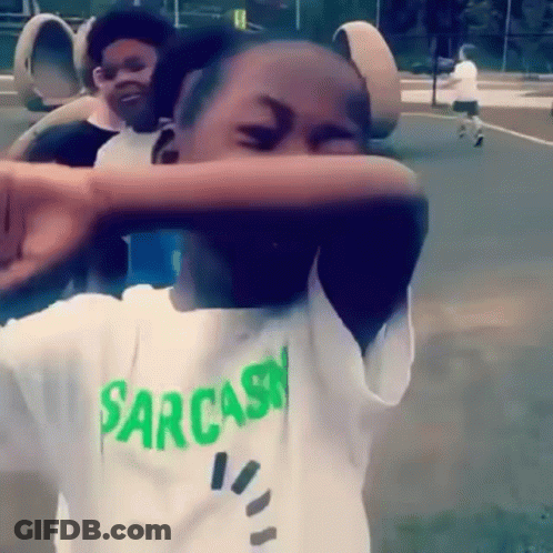 Boy In Sarcasm Shirt Covering Face GIF