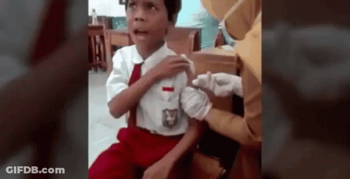 Boy In School Uniform Getting Vaccine GIF