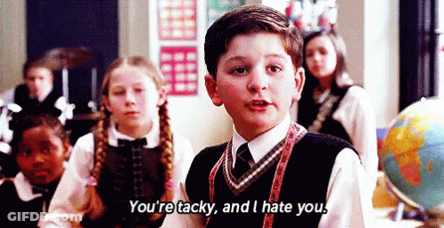 Boy In School Uniform Talking To Children GIF