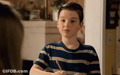 Boy In Striped Shirt Sitting At Table GIF