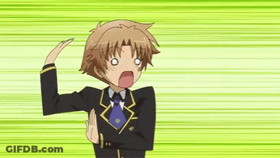Boy In Suit And Tie Crossed Arms Funny Face GIF