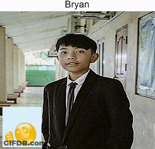 Boy In Suit And Tie Standing In Hallway With Name Bryan Above GIF