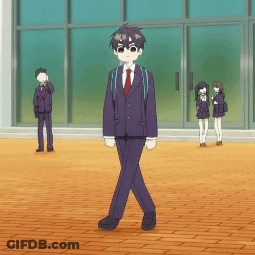 Boy In Suit And Tie Walking In Front Of Window GIF