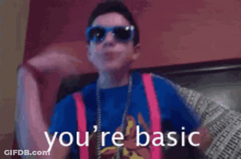Boy In Sunglasses And Suspenders Saying You're Basic GIF