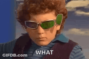 Boy In Sunglasses And Vest Saying What GIF