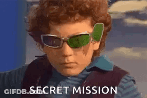 Boy In Sunglasses And Vest Secret Mission GIF