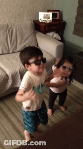 Boy In Sunglasses Next To Girl In Sunglasses GIF