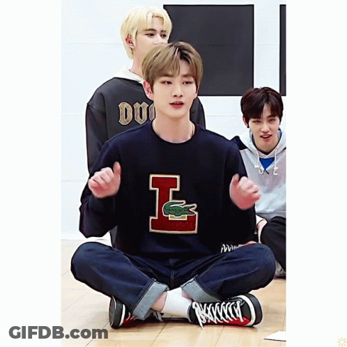 Boy In Sweater With Letter L GIF