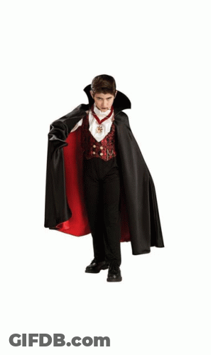 Boy In Vampire Costume With Black Cape GIF