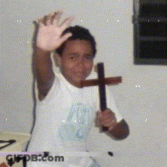 Boy In White Shirt Holding Cross GIF