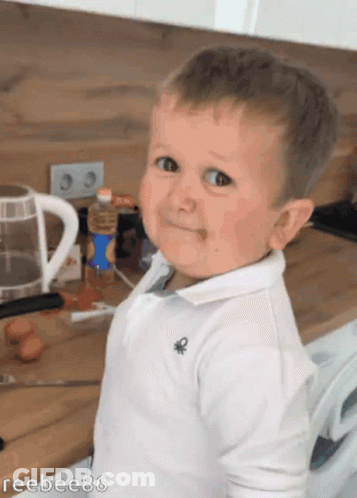 Boy In White Shirt In Kitchen GIF