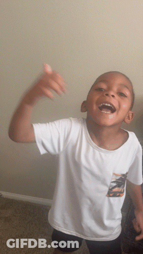 Boy In White Shirt With Palm Tree Laughing GIF