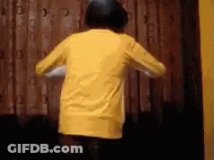 Boy In Yellow Shirt Dancing GIF