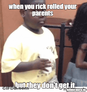 Boy In Yellow Shirt Holding Paper Saying When You Rick Rolled Your Parents GIF