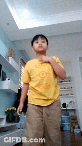 Boy In Yellow Shirt Saying Go On GIF