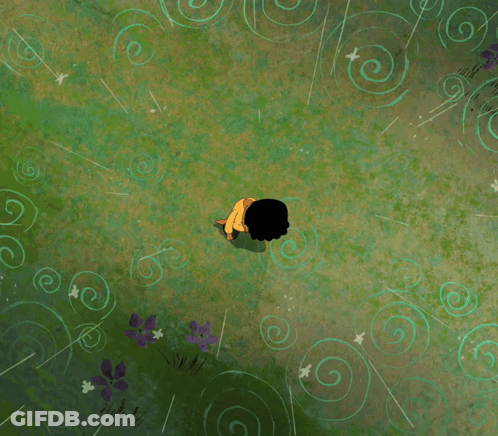Boy In Yellow Shirt Sitting On Grass GIF