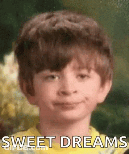 Boy In Yellow Shirt Smiling Says Sweet Dreams GIF