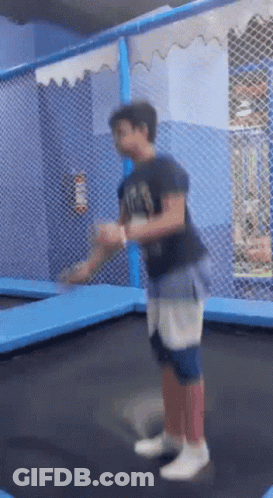 Boy Jumping On Trampoline With RS Shirt GIF