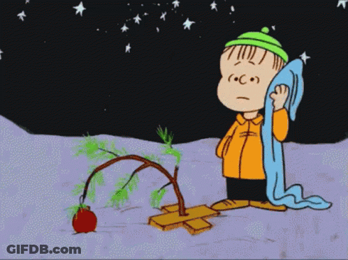 Boy Kneeling Next To Broken Christmas Tree GIF