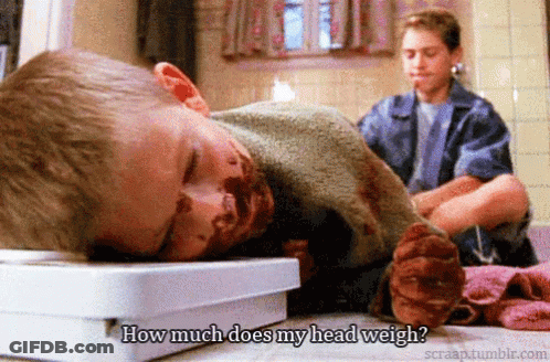 Boy Laying On A Scale Saying How Much Does My Head Weigh GIF
