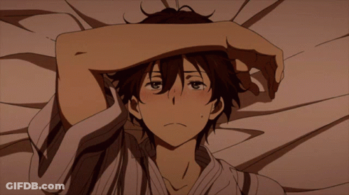 Boy Laying On Bed Covering Face GIF