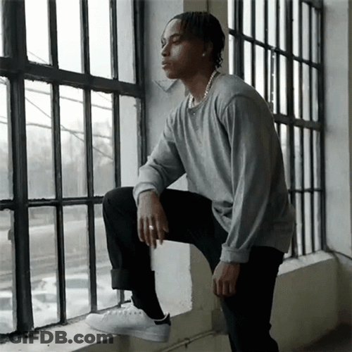 Boy Looking Out The Window GIF