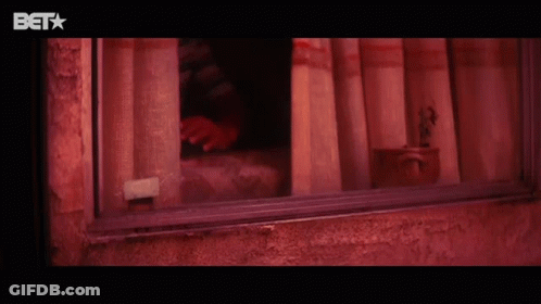 Boy Looking Out Window With BET Logo GIF