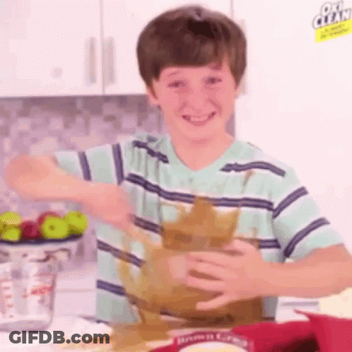 Boy Making Mess With Brownie Mix GIF