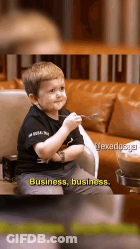 Boy On Couch Holding Spoon Saying Business Business GIF