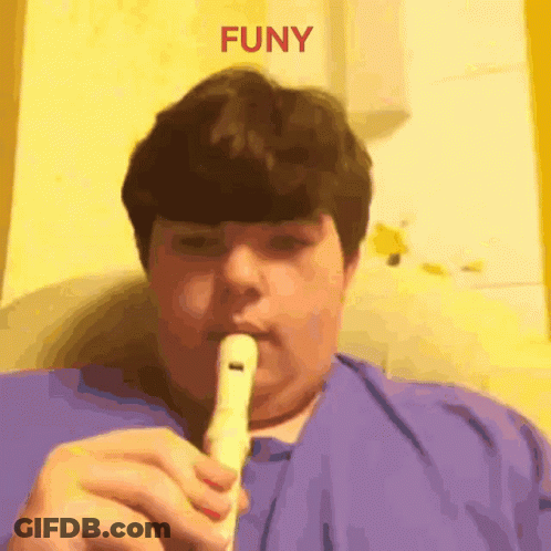 Boy Playing Flute Saying Funy GIF