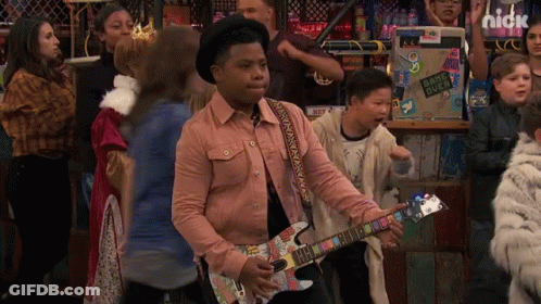 Boy Playing Guitar With Game Over Sticker GIF