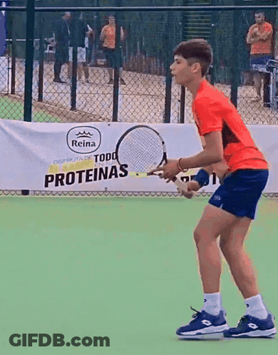 Boy Playing Tennis With Proteinas Banner GIF