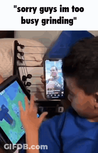 Boy Playing Video Game On Tablet Another Boy On Phone GIF