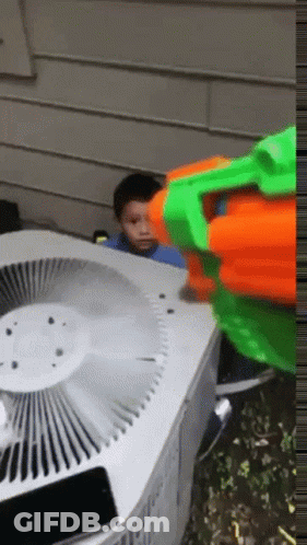 Boy Playing With Nerf Gun GIF