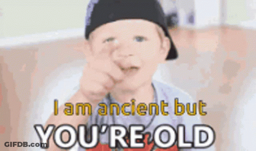 Boy Pointing At Camera Saying I Am Ancient But You're Old GIF