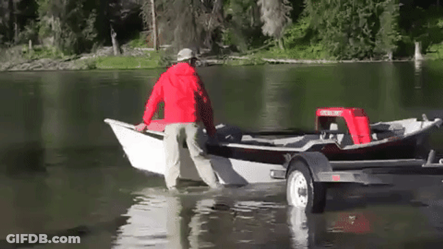 Boy Pulling Skiff Near Him GIF