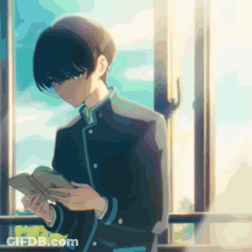 Boy Reading Book In Front Of Window GIF