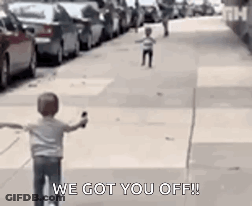 Boy Riding Bike With Another Boy Running Behind GIF