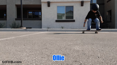 Boy Riding Skateboard With Ollie GIF