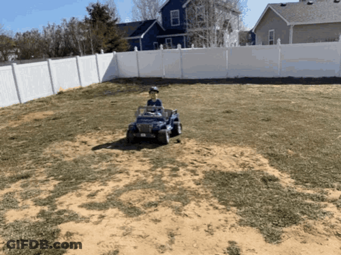 Boy Riding Toy Car Thumbs Up Kid GIF