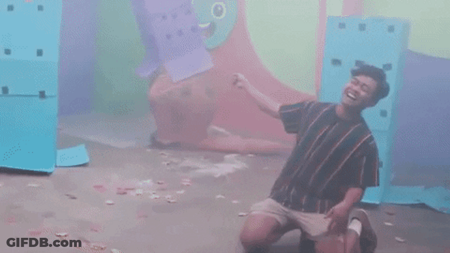 Boy Rolling On Floor Laughing GIF