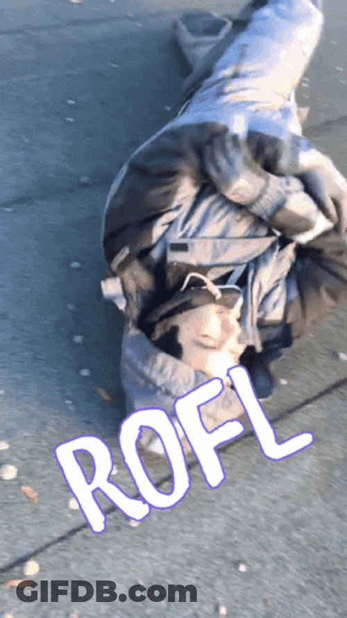 Boy Rolling On The Floor Laughing GIF