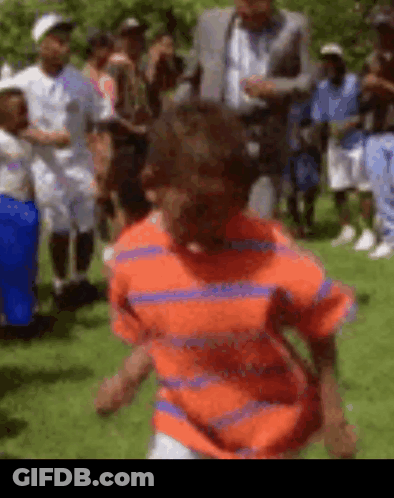 Boy Running In Orange And Blue Striped Shirt GIF
