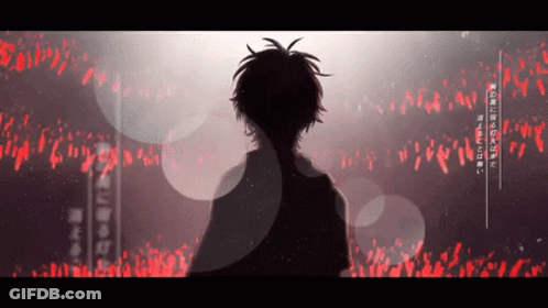 Boy Silhouette In Front Of Crowd With Red Lights GIF