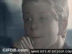 Boy Singing Into Microphone GIF
