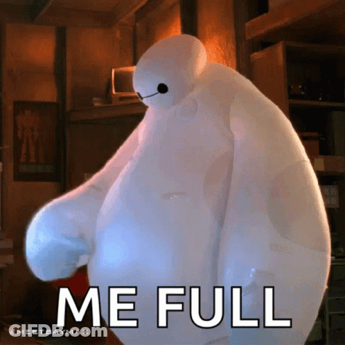 Boy Sitting At Table Looking GIF